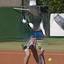 A male tennis player reaches to return the ball..jpg